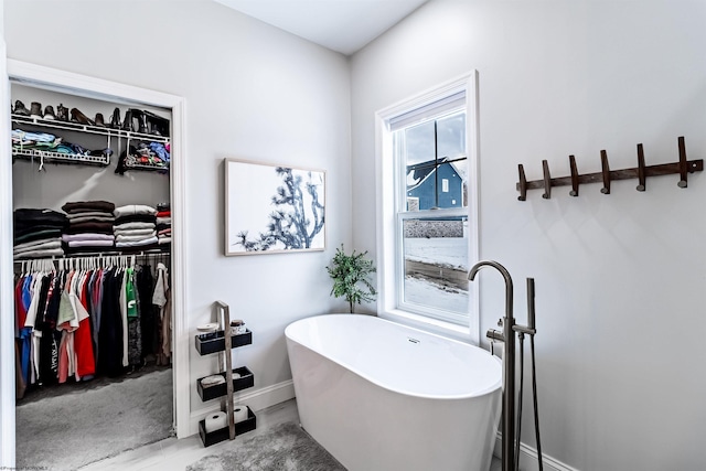 bathroom with a washtub