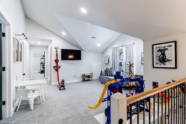 playroom with carpet flooring and vaulted ceiling