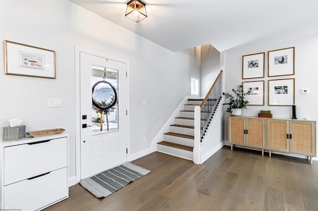 entryway featuring dark wood-type flooring