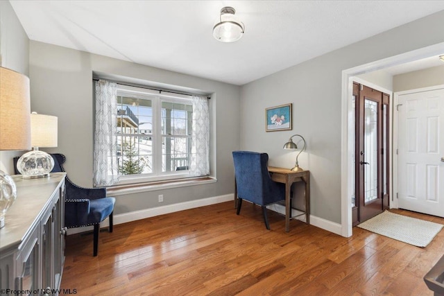 office with hardwood / wood-style floors