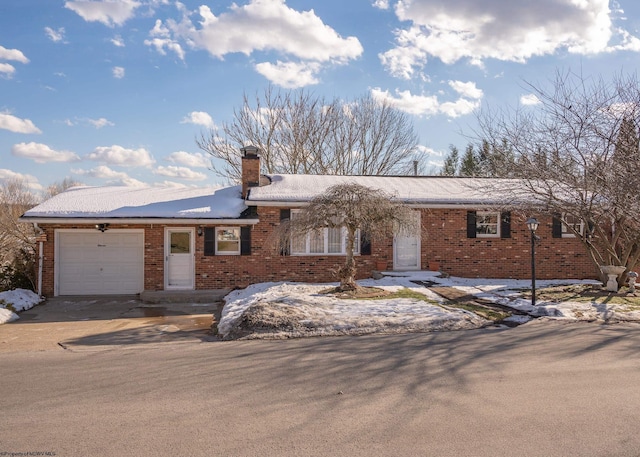 ranch-style home with a garage