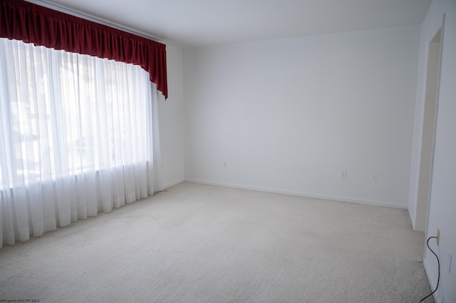 empty room with light carpet