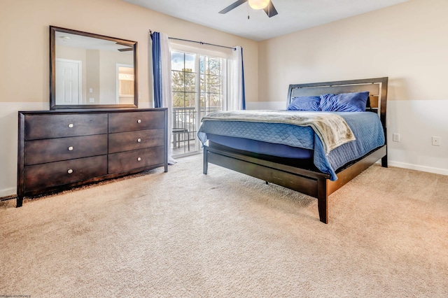 carpeted bedroom with access to outside and ceiling fan