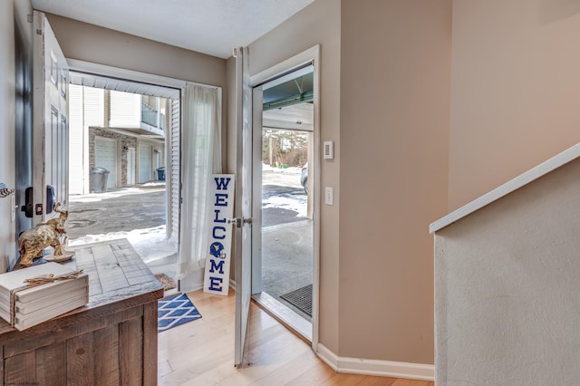 doorway featuring light hardwood / wood-style floors