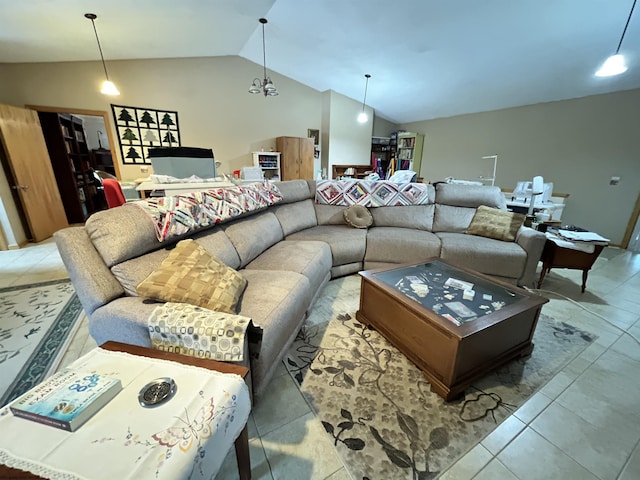 living room featuring lofted ceiling and light tile patterned flooring