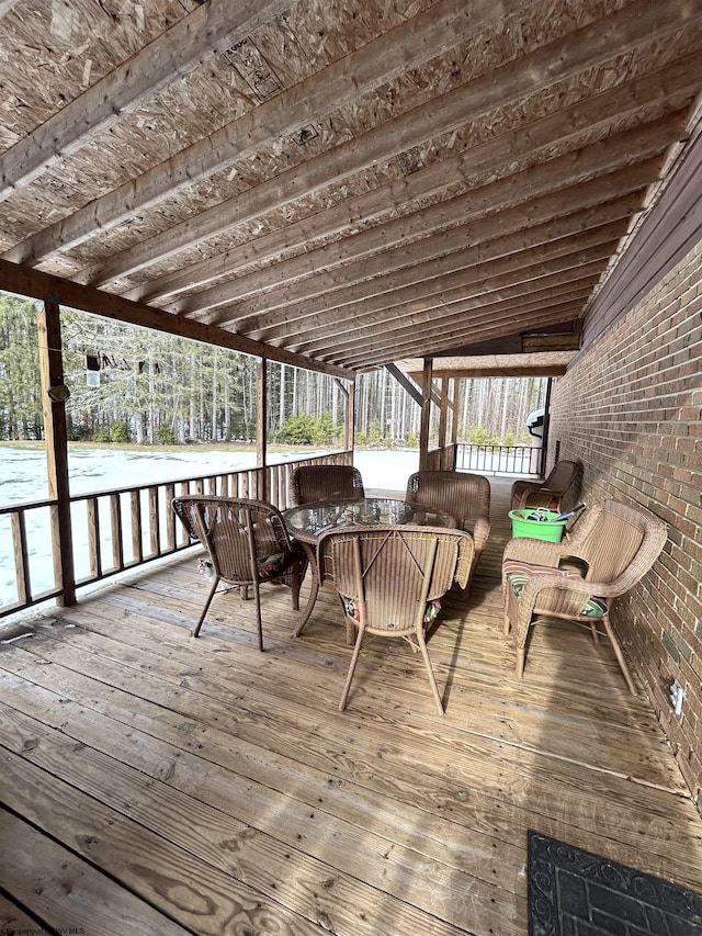 wooden deck with an outdoor hangout area