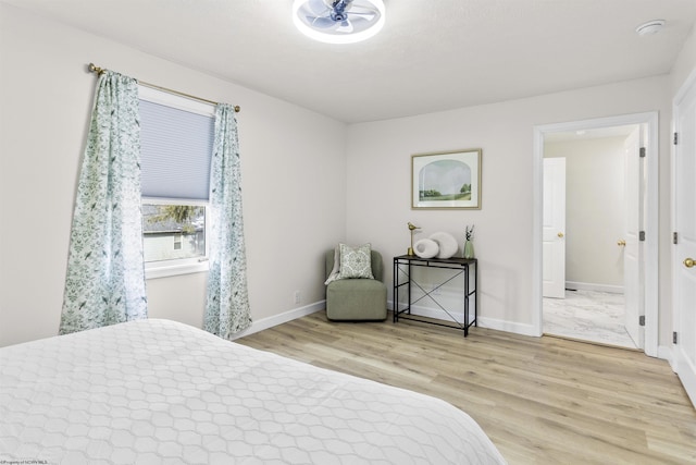 bedroom featuring hardwood / wood-style floors