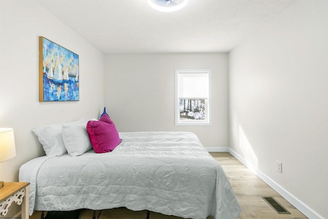 bedroom featuring light wood-type flooring