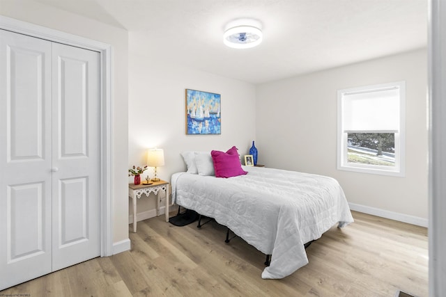 bedroom with light hardwood / wood-style flooring