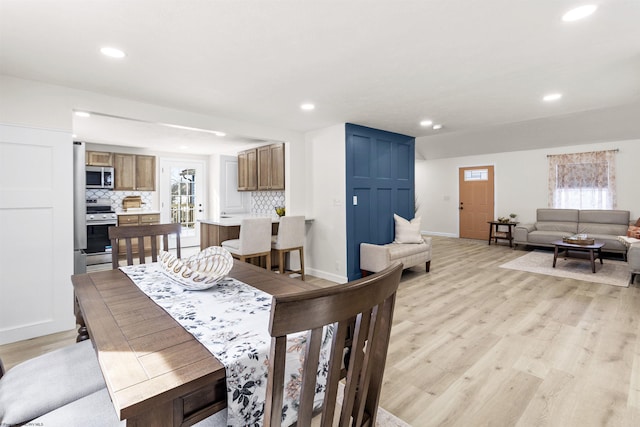 dining room featuring light hardwood / wood-style flooring