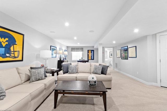 living room featuring light carpet