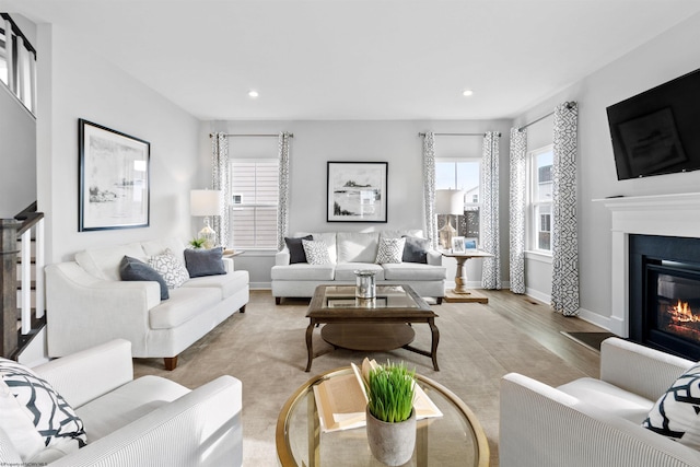 living room with light hardwood / wood-style flooring