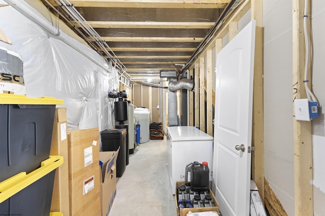 basement with washer / clothes dryer and refrigerator