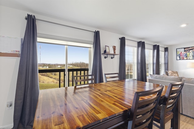 dining area with light wood-type flooring