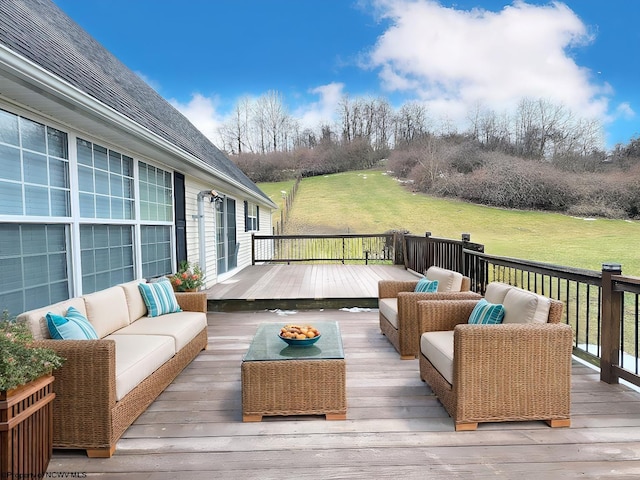 deck featuring a yard and outdoor lounge area