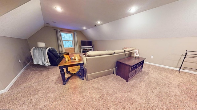 carpeted cinema room with lofted ceiling