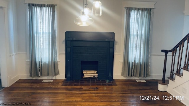 living room with dark wood-type flooring