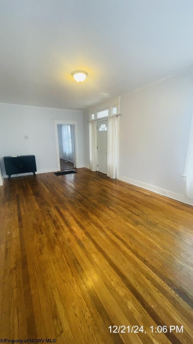 interior space with hardwood / wood-style flooring