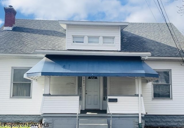 entrance to property with a porch