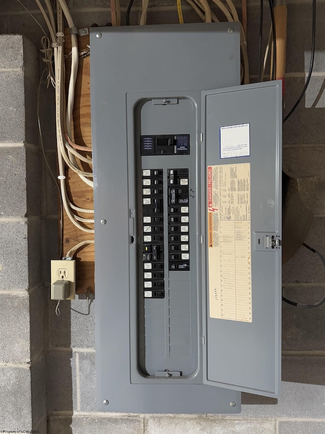 utility room featuring electric panel