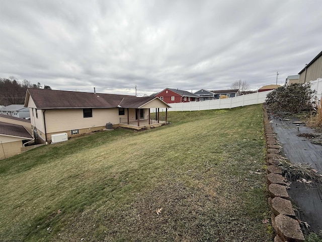 view of yard featuring central AC