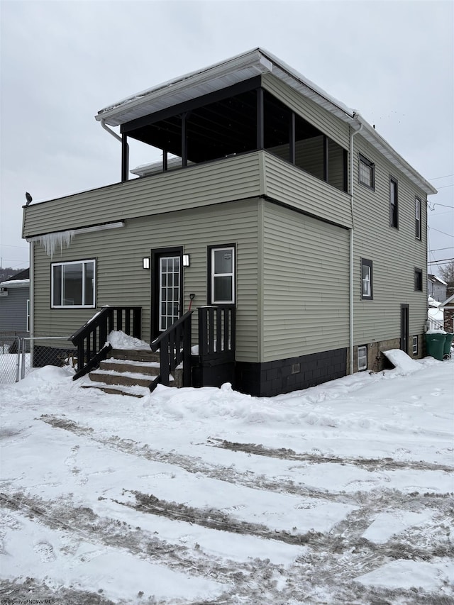 view of snow covered property