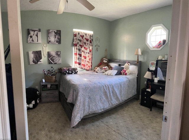 bedroom with light carpet and ceiling fan