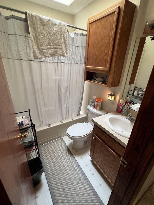 full bathroom with vanity, toilet, and shower / bath combo with shower curtain