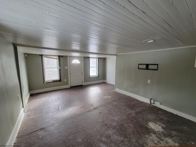 foyer entrance featuring wood ceiling