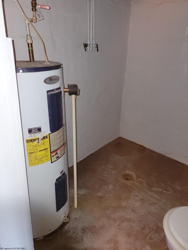 utility room featuring electric water heater