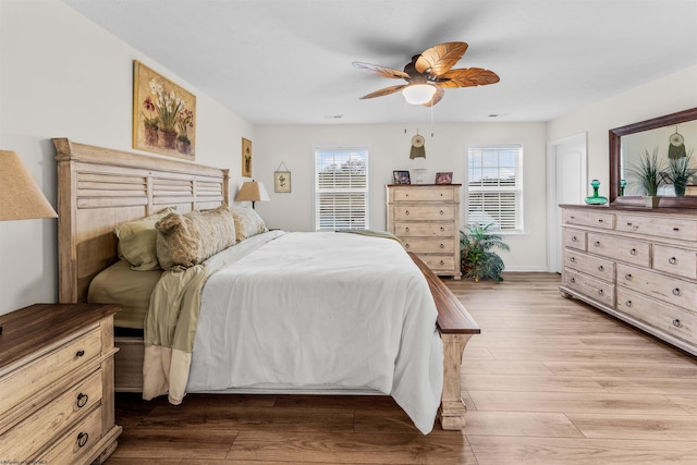 bedroom featuring ceiling fan and light hardwood / wood-style floors