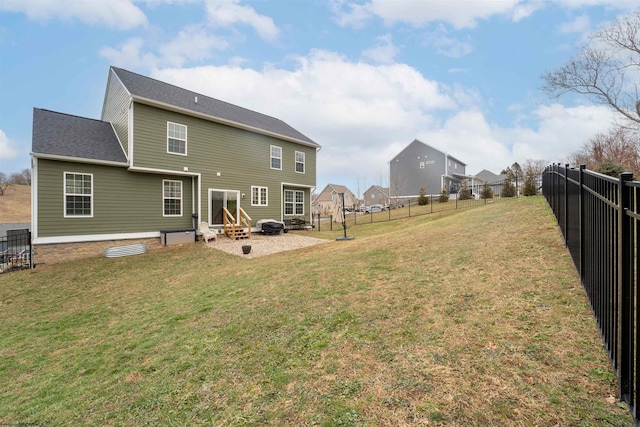 back of property featuring a lawn and a patio