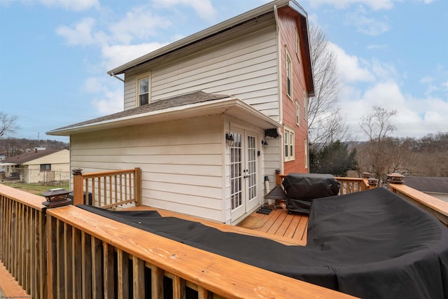 deck with area for grilling and french doors