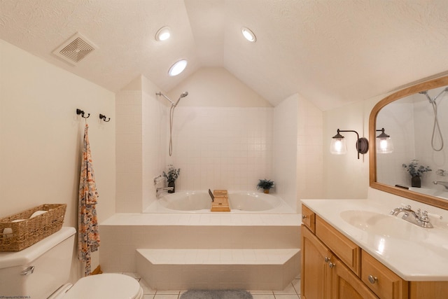 full bathroom with lofted ceiling, tiled shower / bath combo, vanity, a textured ceiling, and toilet