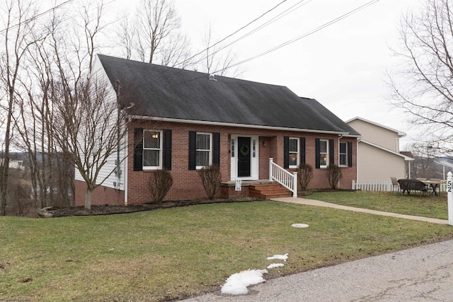 view of front facade featuring a front yard