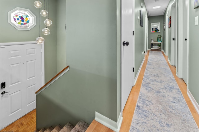 hallway with light parquet floors