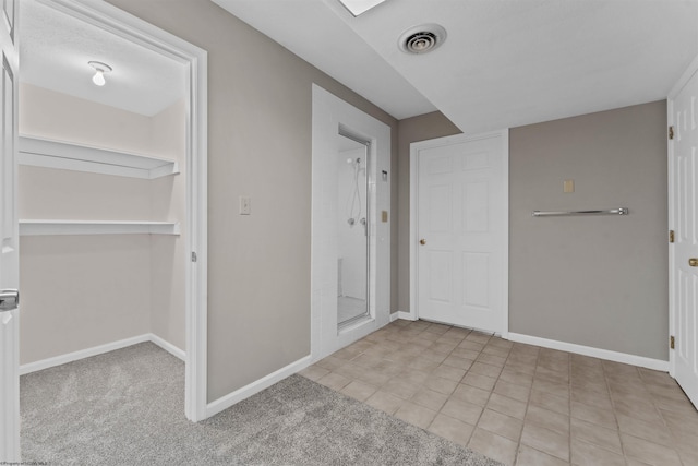 interior space featuring light tile patterned flooring