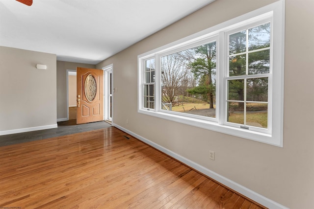 entrance foyer with hardwood / wood-style floors