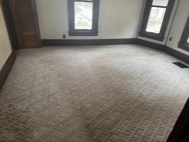 empty room with carpet floors