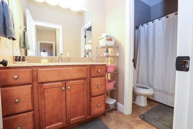 bathroom with a shower with curtain, vanity, toilet, and tile patterned flooring