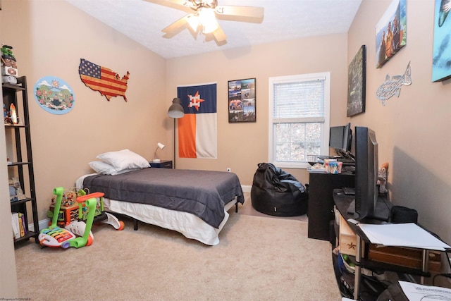 carpeted bedroom with ceiling fan