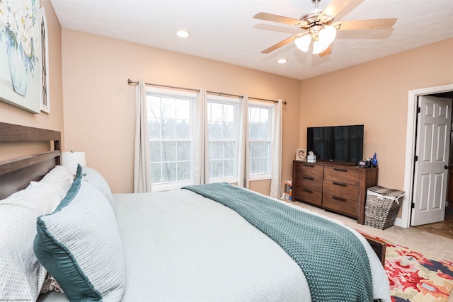 bedroom featuring ceiling fan and carpet flooring