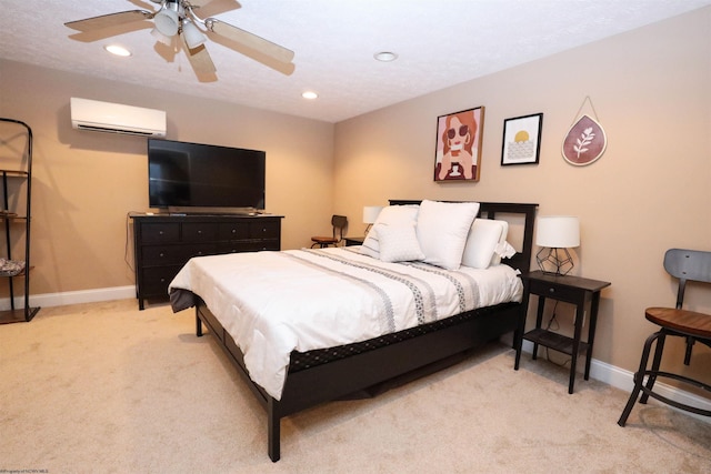 bedroom featuring ceiling fan, light carpet, and a wall unit AC