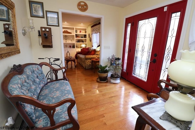 entrance foyer with light hardwood / wood-style flooring