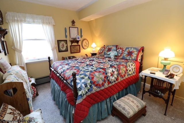 bedroom featuring carpet flooring and baseboard heating