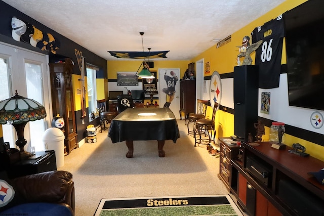 recreation room featuring carpet flooring