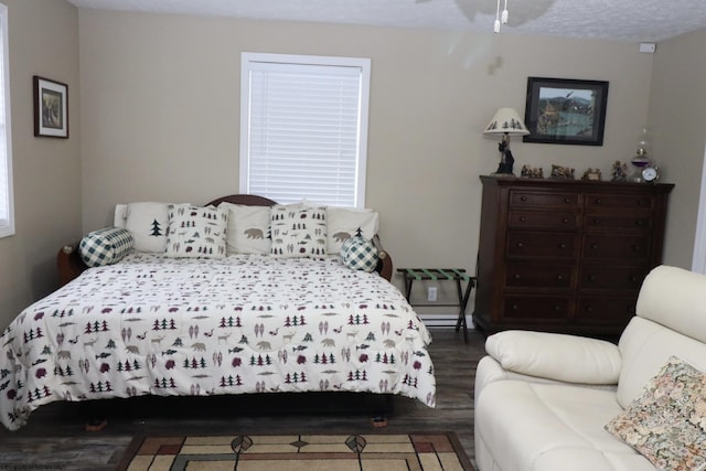 bedroom featuring hardwood / wood-style flooring