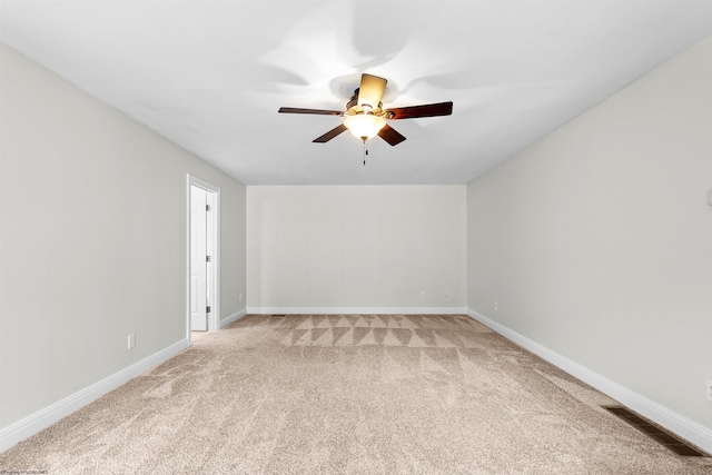 empty room with carpet and ceiling fan