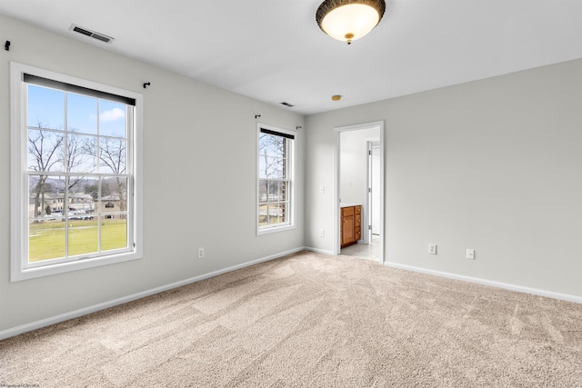 view of carpeted spare room