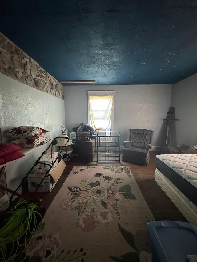 bedroom featuring dark wood-type flooring